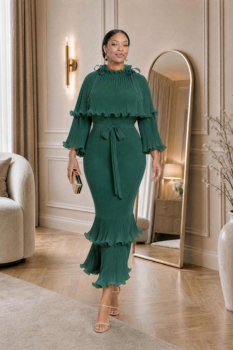 Arabella Plissé Cape Dress in emerald, walking