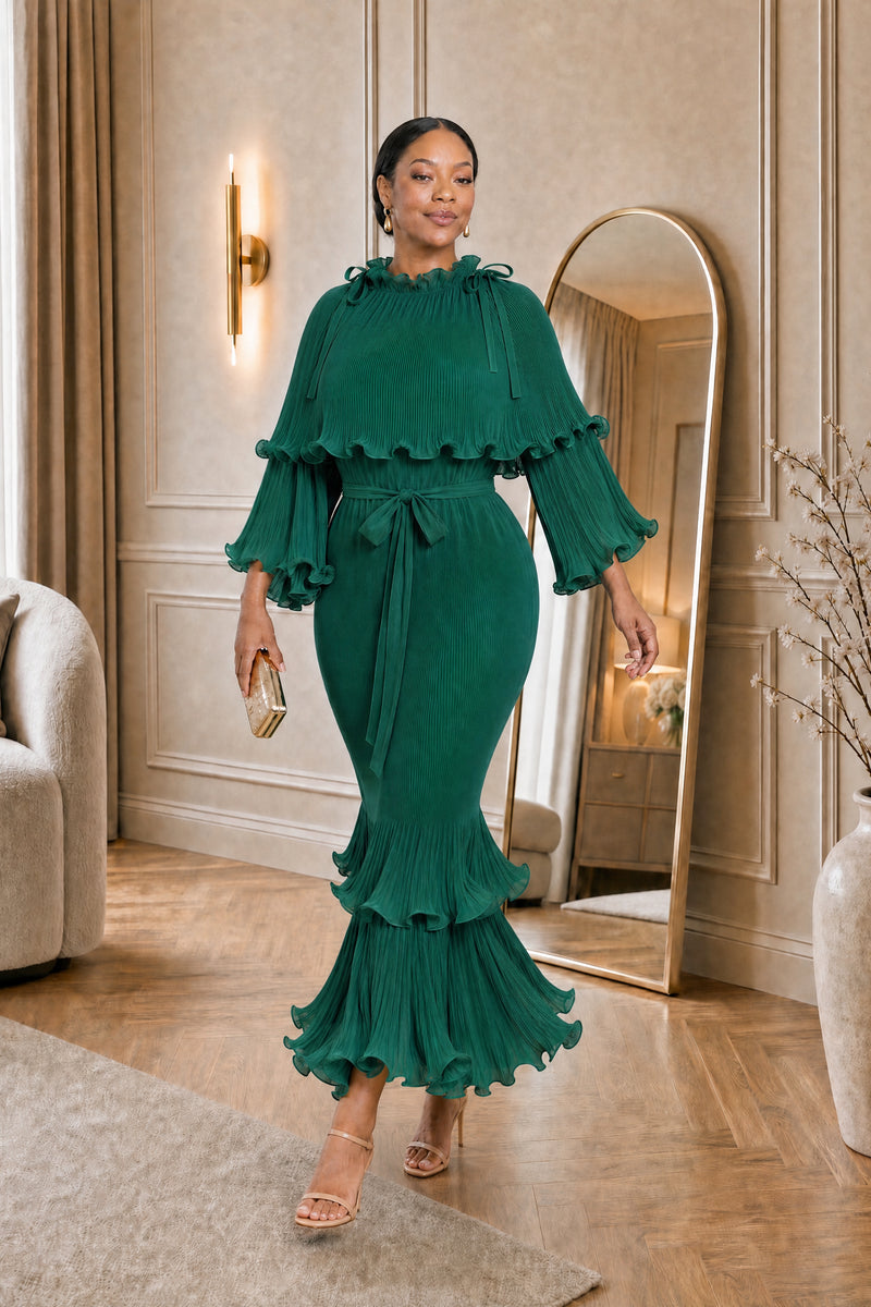Arabella Plissé Cape Dress in emerald, walking